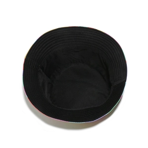 Internal view of reversible rainbow bucket hat showing black lining and neat stitching