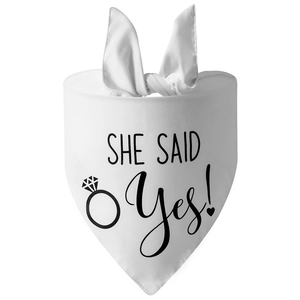 Macro detail of white wedding pet bandana featuring black She Said Yes print with diamond icon