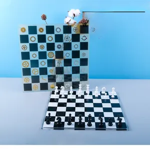 Detail view of DIY resin chess set with board and pieces in black and white finish