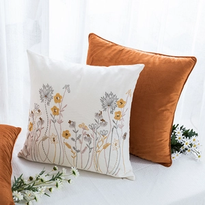 Nordic floral embroidered cotton pillowcase set with cream and caramel throw cushions