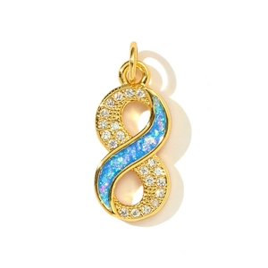 Detailed view of infinity symbol charm with blue opal and gold-plated cubic zirconia