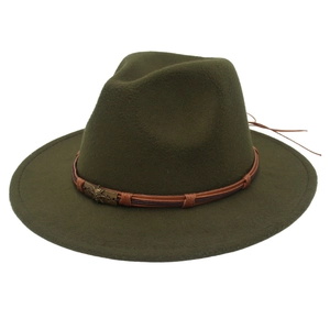 Classic dark green felt fedora hat with brown leather band and antique skull metal badge