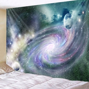 Detail of galaxy star nebula tapestry showing vibrant cosmic swirl printed on fabric