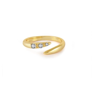 Detailed macro of gold S925 sterling silver ring with three graduated zircon stones