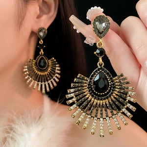Vintage teardrop earrings with black gems and sparkling tassel fringe for luxury events