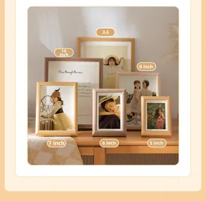 Various sizes of solid wood photo frames in natural oak and walnut finishes