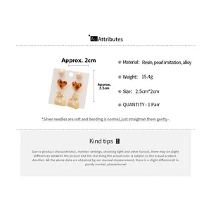 Detail showing leopard print earrings dimensions and material specifications on white background
