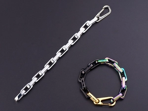 Detailed macro shot of thick hip hop titanium steel chains in silver and iridescent finish