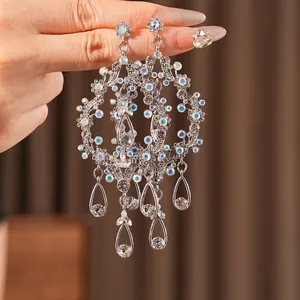 Exquisite silver drop earrings with sparkling rhinestones and crystal tassels