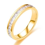 Macro view of gold eternity band with channel-set square-cut white zircons