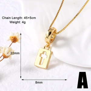 Close-up of gold 18k plated elephant cross necklace with 45+5cm box chain dimensions