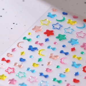 3D embossed gold nail art stickers with colorful resin stars and moon patterns