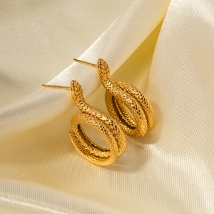 18K gold plated stainless steel snake earrings with scale texture on silk background