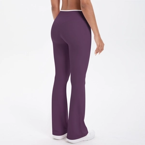 Detailed back view of purple high waist yoga flare pants with white contrast piping trim