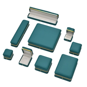 Luxury dark green jewelry box set with gold trim for rings, necklaces, and bracelets