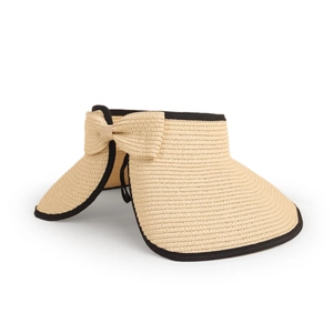 Macro detail of natural straw sun visor with black fabric trim and woven bow