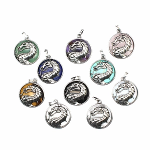 Detail showing colorful round natural stone pendants with engraved dragon design