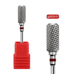 Macro view of cylindrical alloy nail drill bit with cross-cut texture and red base