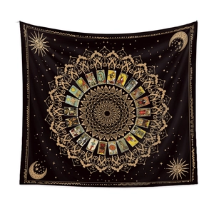 Bohemian black and gold moon phase tapestry featuring sun and tarot card sun motifs