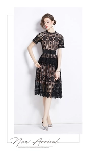 Detail of elegant black hollowed-out floral lace texture and matching waist belt