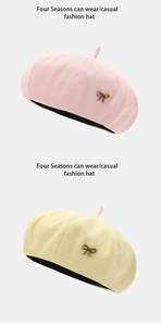 Detail of waffle knit berets in pink and yellow with vintage metal bow accents