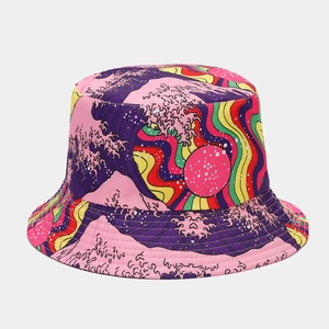 Detail of colorful reversible bucket hat with artistic wave patterns and pop art colors