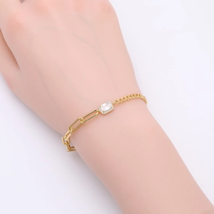 Elegant gold square zircon bracelet featuring a unique clip and Cuban chain design