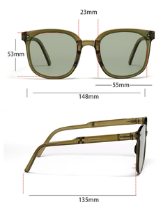 Foldable sunglasses with green frames showing frame width 148mm and lens height 53mm