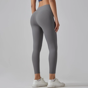 Detail view of high-waisted seamless yoga pants with butt-lifting cut in grey fabric