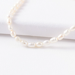 Macro shot of irregular baroque freshwater pearls showing natural luster and texture