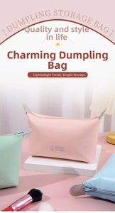 Detail of light pink PU leather dumpling makeup bag with LOVE print and zipper closure