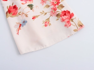 Detailed close-up of floral print on soft chiffon fabric with clean stitching finish