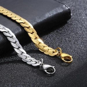 Minimalist curb chain bracelet in gold and silver stainless steel with lobster clasp