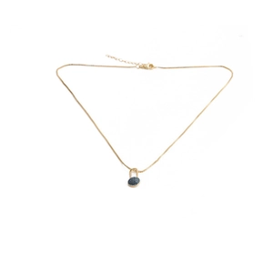 Golden necklace with circular blue zircon lock pendant and fine box chain on white