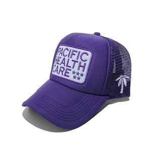 Detail view of purple trucker hat with coconut tree embroidery and mesh back