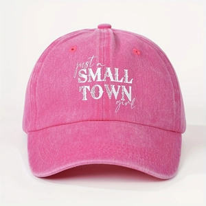 Pink washed cotton baseball cap with Small Town Girl slogan shown in front view
