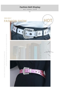 Detail of rhinestone studded punk belts in sparkling white and hot pink with large buckles