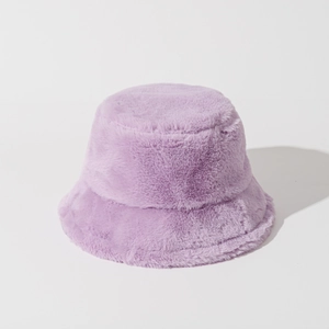 Chic purple faux fur bucket hat with soft plush texture for stylish winter warmth