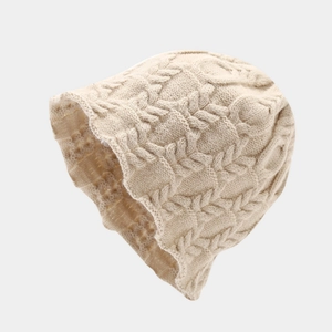 Chunky beige cable knit beanie for men and women featuring a retro textured pattern