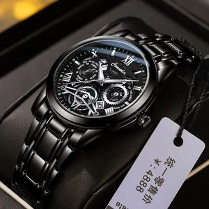 Close-up of black stainless steel hollow dial mechanical watch with luminous hands