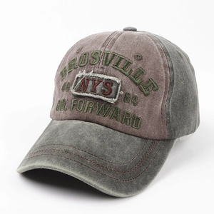 Detail of vintage washed cotton baseball cap with retro NYS and Brosville embroidery