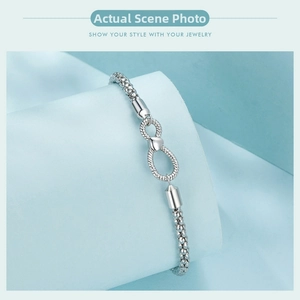 Detailed view of 925 sterling silver infinity heart bead chain bracelet craftsmanship