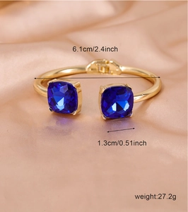 Detailed view of square blue gem cuff bracelet with 6.1cm inner diameter and weight specs