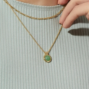 Double-layered 24K gold plated Figaro necklace featuring a round green aventurine pendant