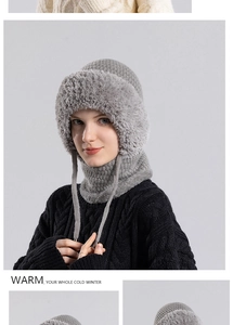 Close-up of gray knit windproof hooded scarf with thick faux fur lining for winter warmth
