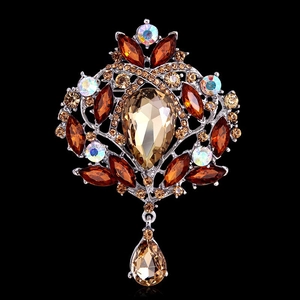 Detail view of vintage brooch with champagne waterdrop crystal and intricate rhinestones