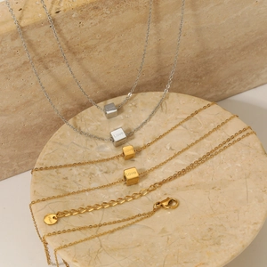 Minimalist double-layer stainless steel necklace with engraved Love cube pendants