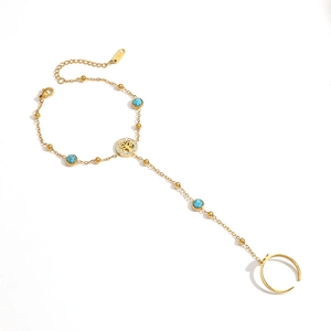 Gold plated tree of life finger bracelet with turquoise beads and sparkly rhinestones