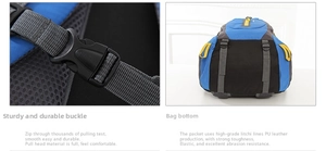 Close-up of durable plastic buckle and breathable mesh fabric on large travel backpack