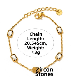 Detail of gold stainless steel bracelet with five rectangular zircon stones and extension chain